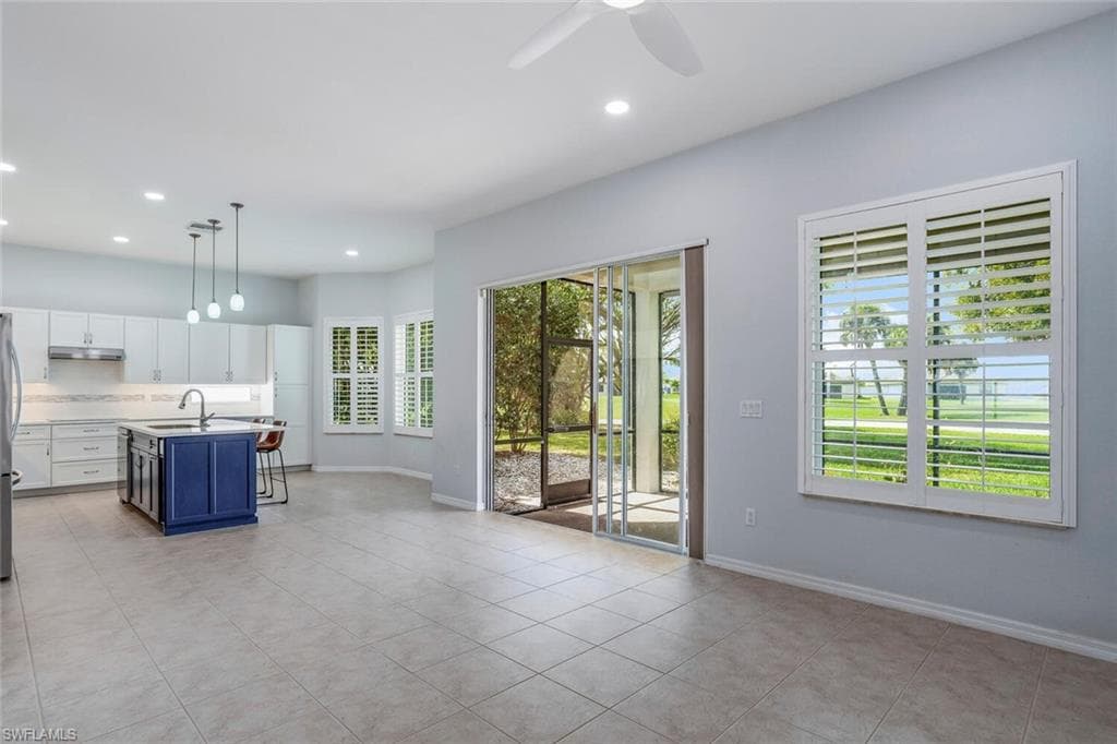 Natural Light, Plantation Shutters, Family Room and Kitchen