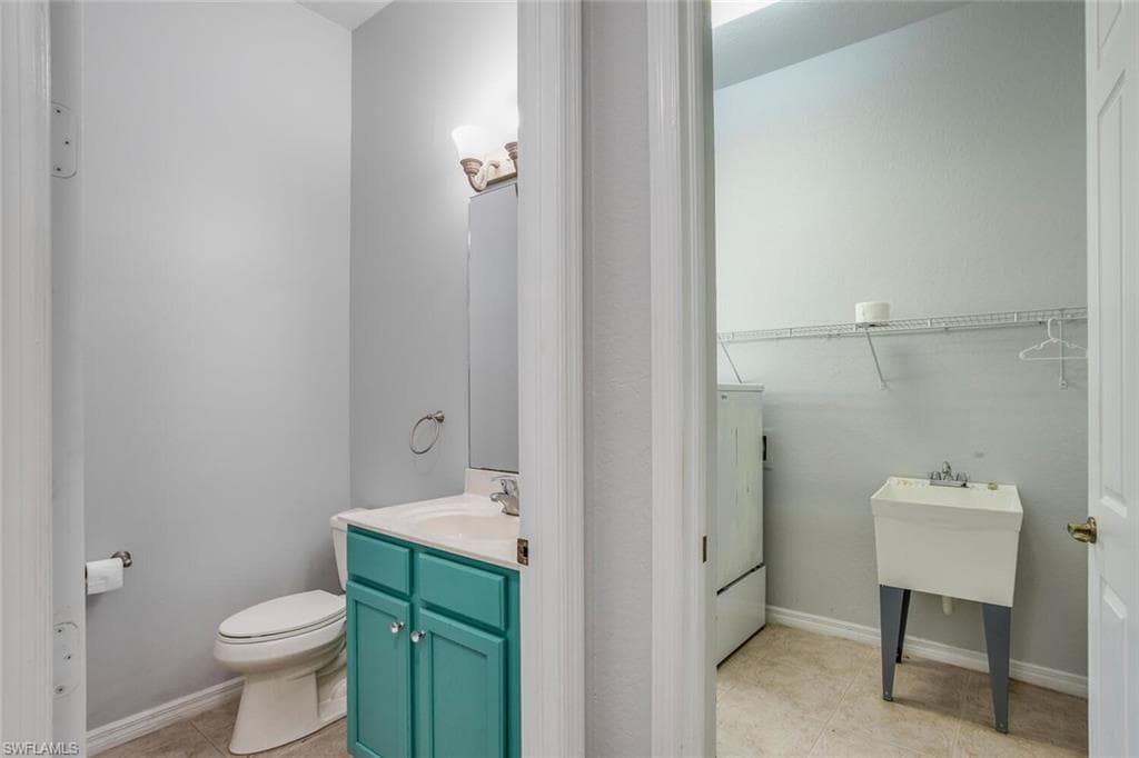 First Floor Powder Room and Separate Laundry Room