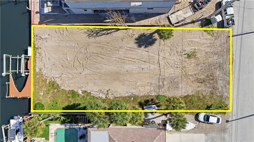 Aerial view of property's location featuring property boundaries highlighted - Virtually Edited Image