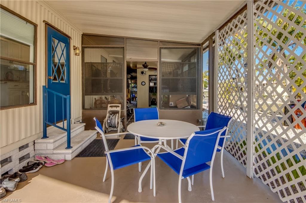 Sunroom with outdoor patio, and entry steps