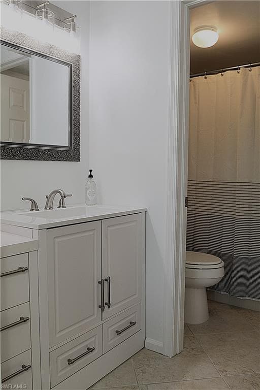 Bathroom featuring vanity and a shower with curtain