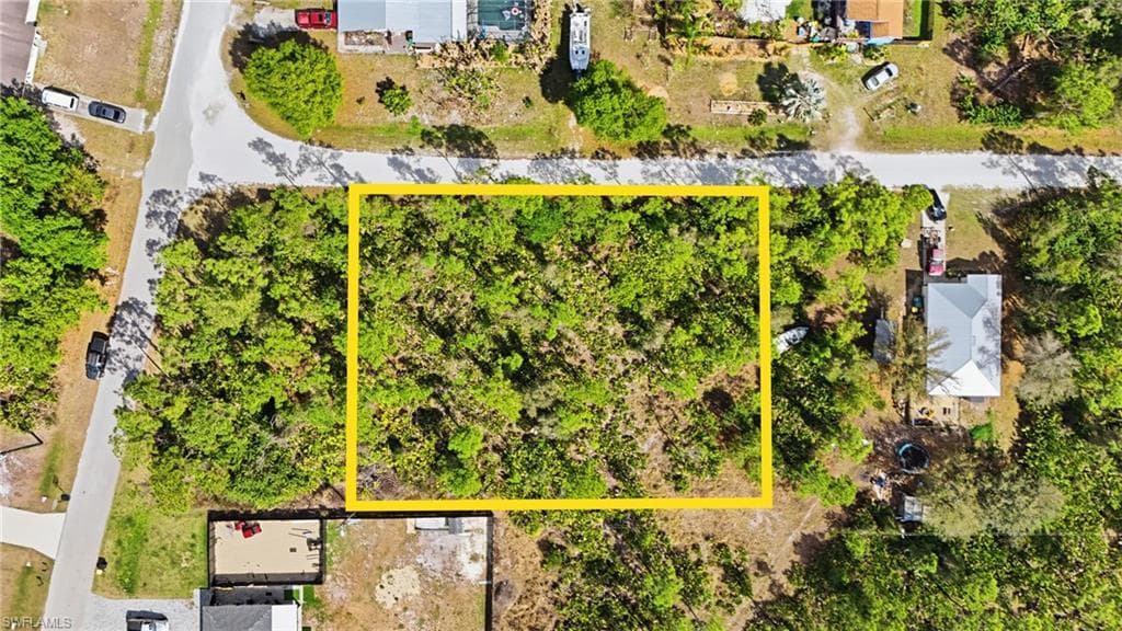 Aerial overview of property's location with property parcel outlined