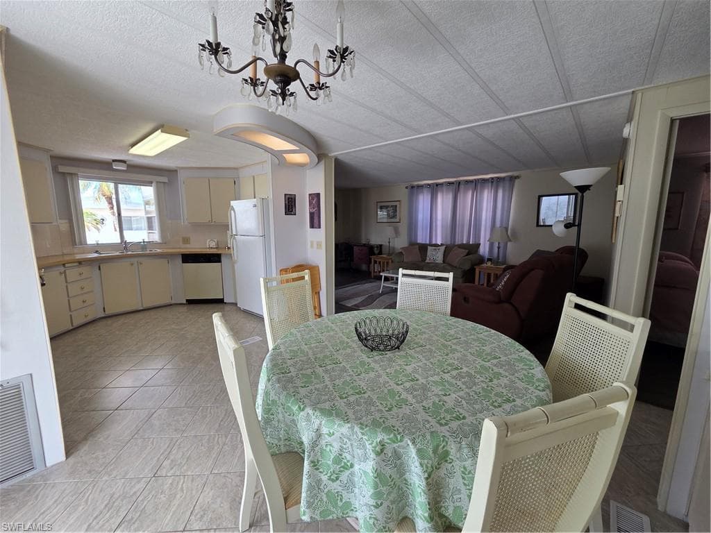 View of Kitchen, Dining, and Living Room.