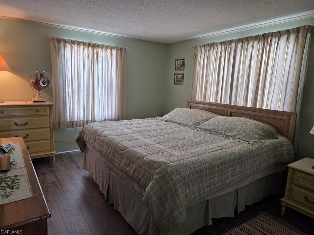Primary bedroom easily accommodates a king-size bed.
