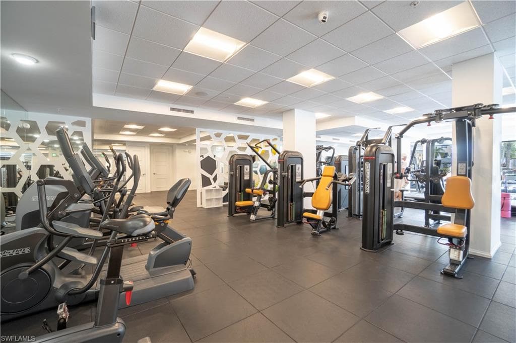 Fitness center featuring extensive exercise equipment
