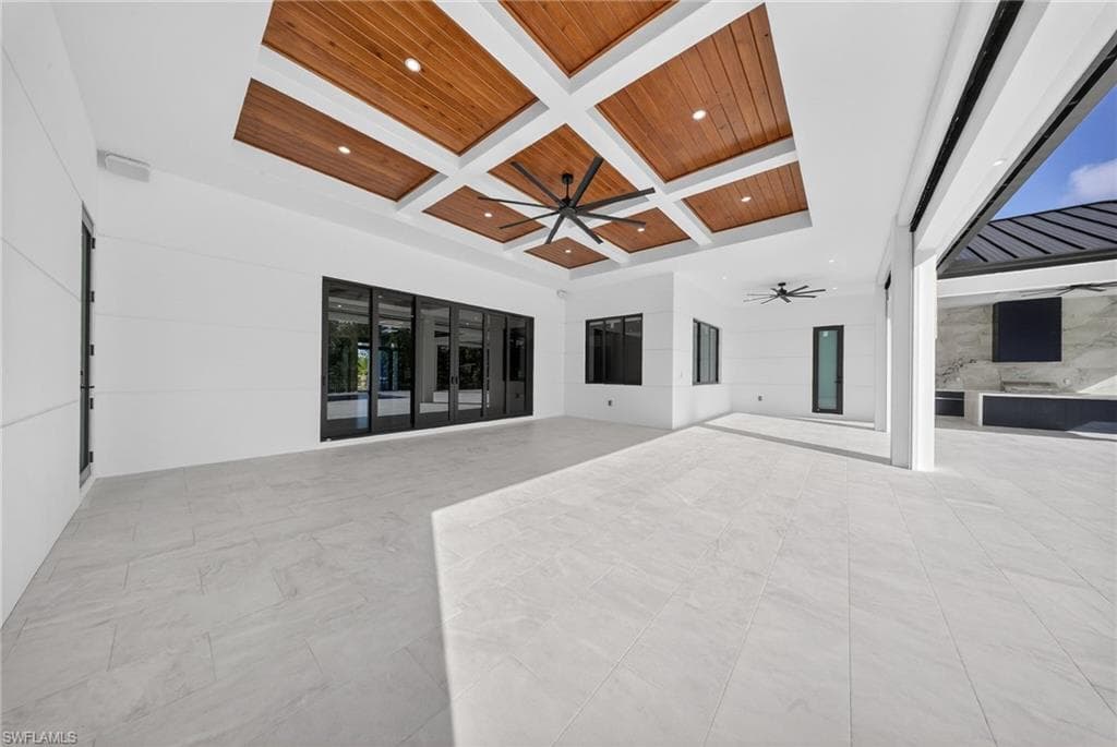 View of patio featuring ceiling fan