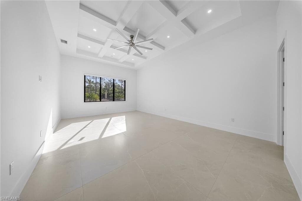 Unfurnished room with coffered ceiling, ceiling fan, and recessed lighting