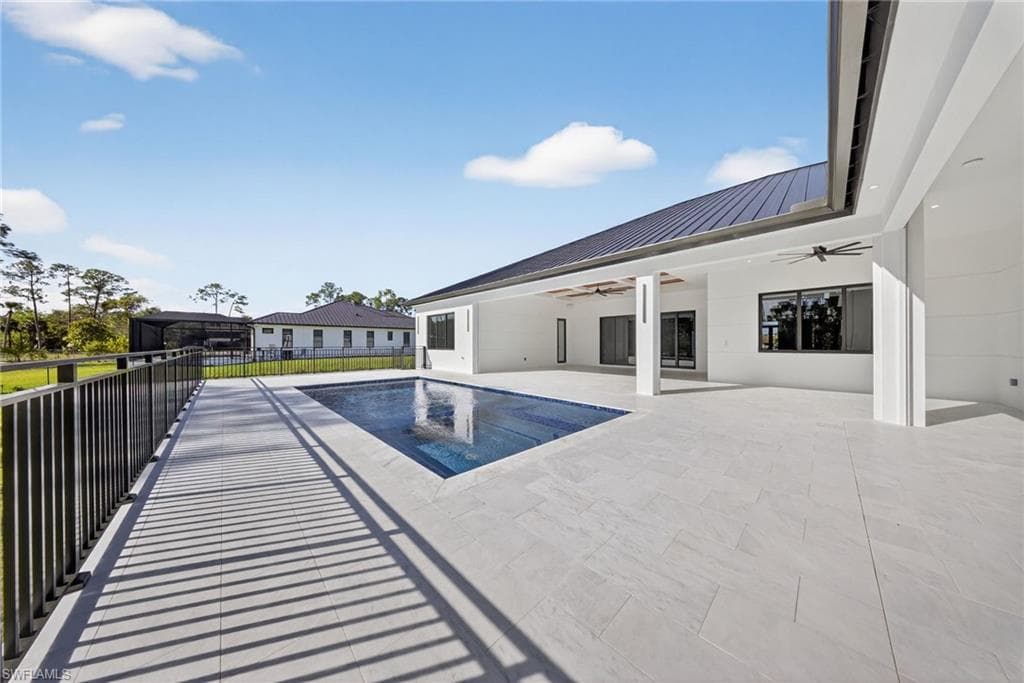 View of pool featuring patio surround