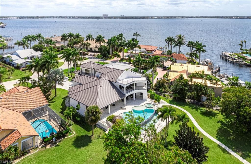 Aerial view of residential area with a nearby body of water
