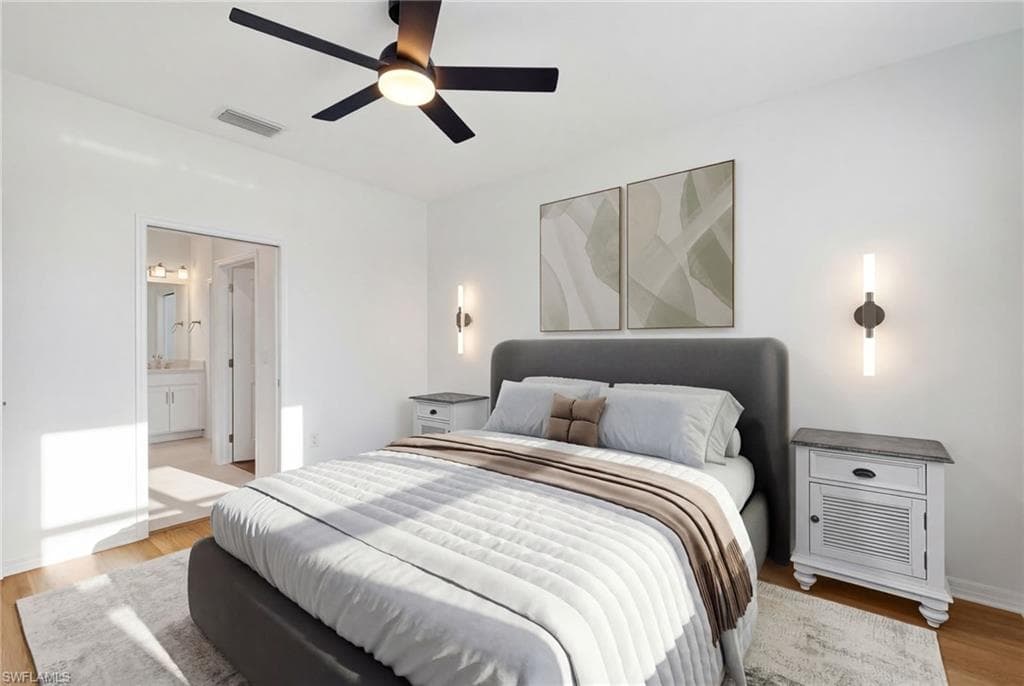 Bedroom with light wood-type flooring and ceiling fan