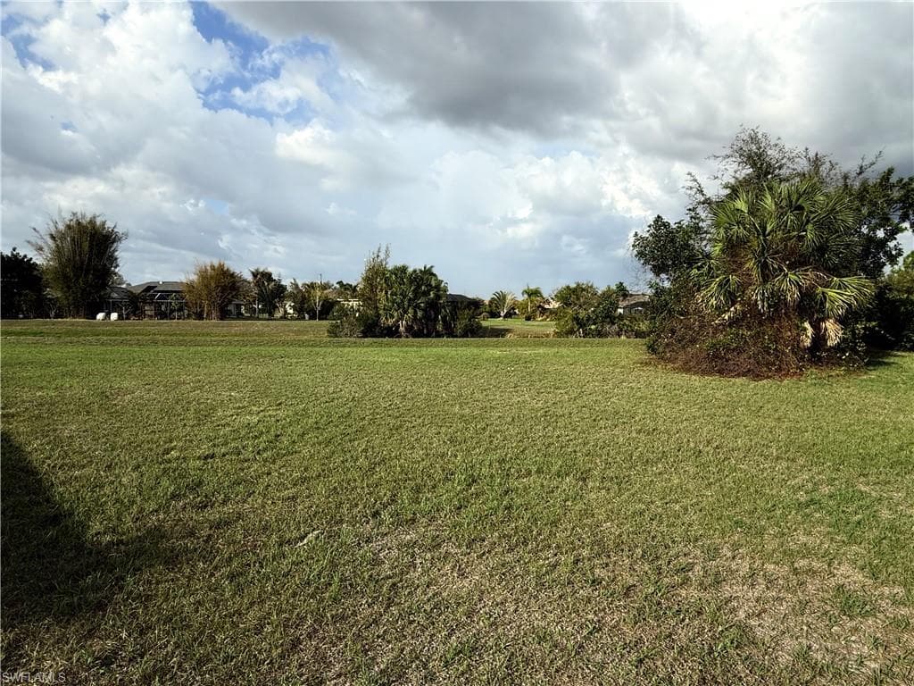 View of grassy yard featuring a view of rural / pastoral area