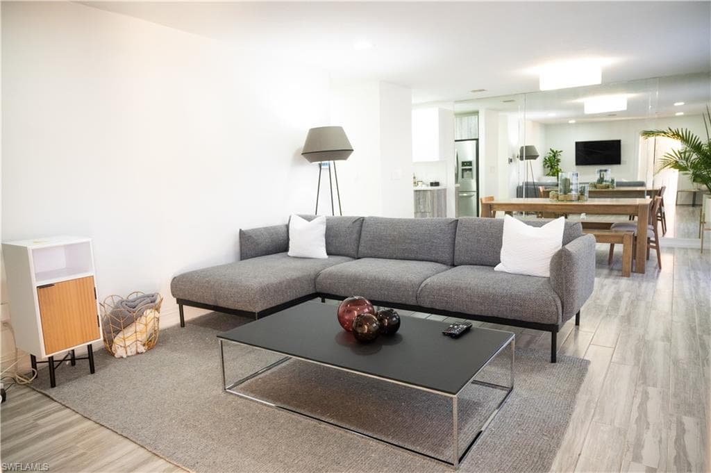 Living area featuring light wood finished floors