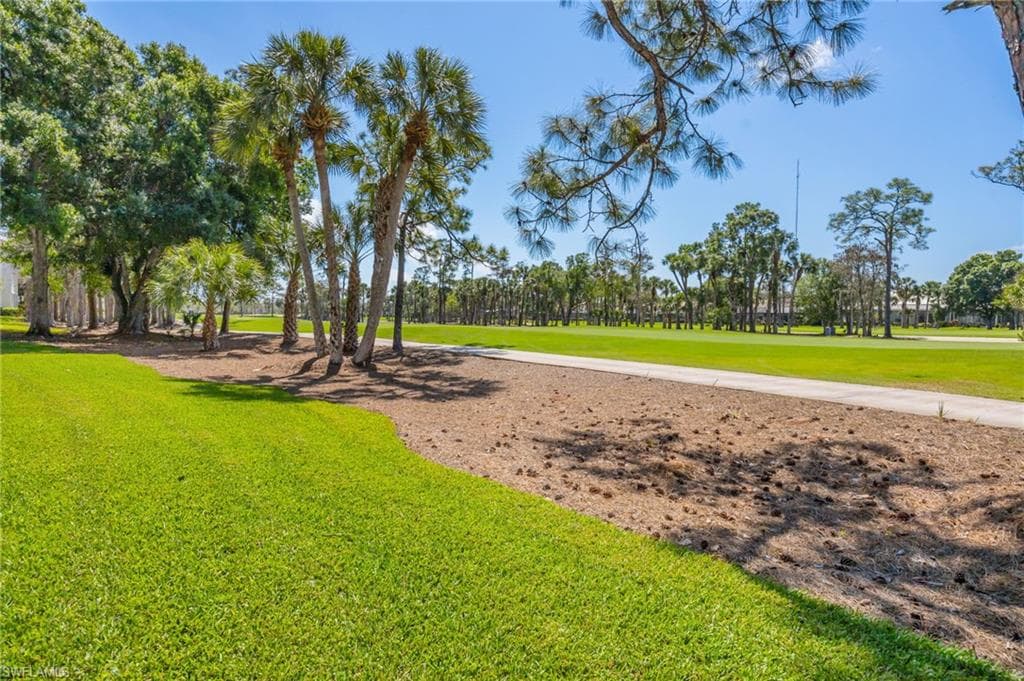Surrounding community featuring view of golf course