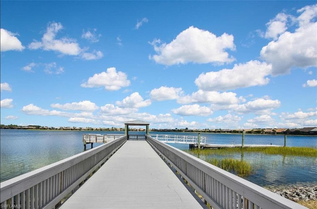 Dock area featuring a water view and a gazebo