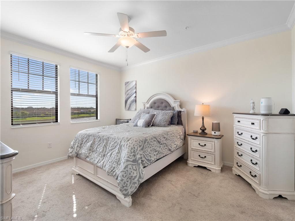 Dining space featuring crown molding and baseboards