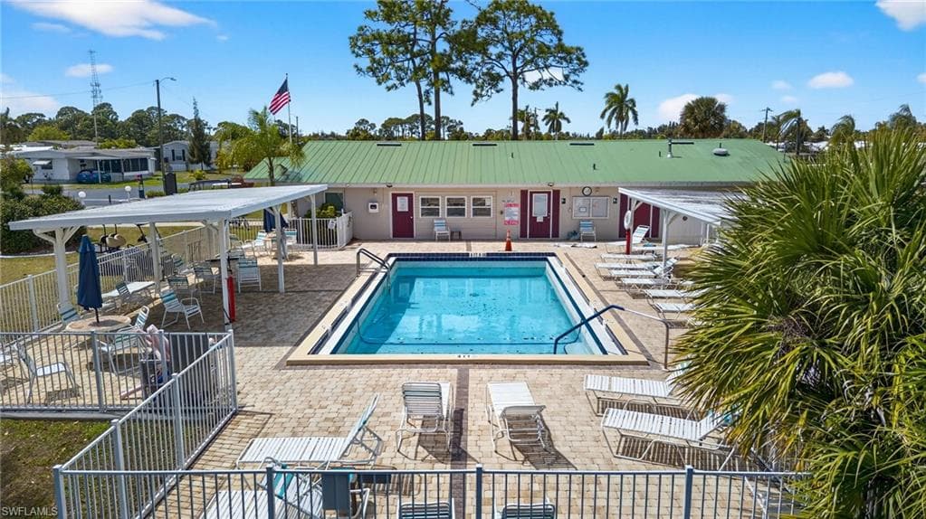 Community pool with a patio area