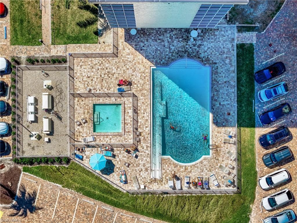 Drone / aerial view of a pool area