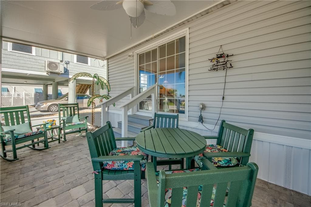 Deck featuring a patio and ceiling fan