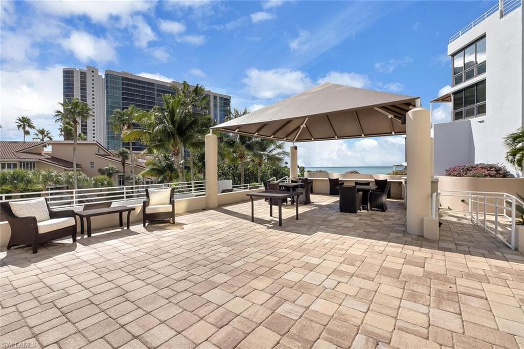 View of patio / terrace with outdoor dining area and a gazebo