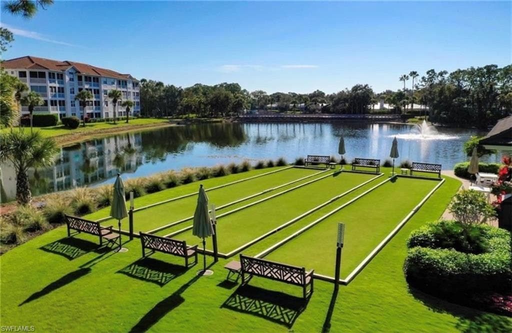 View of home's community with a water view