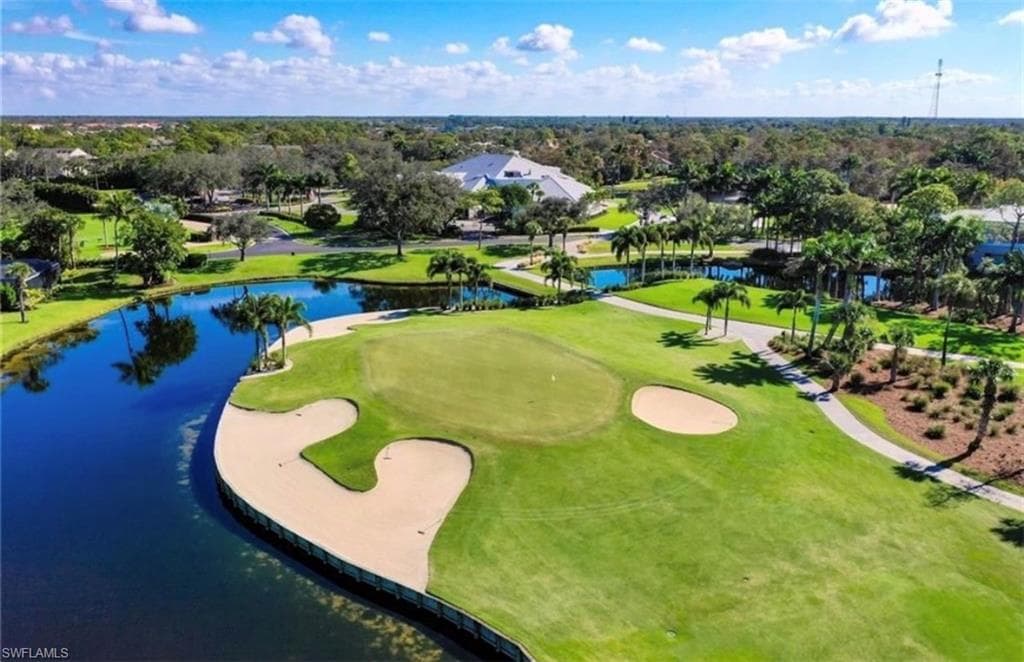 Aerial view of a nearby body of water and a golf club