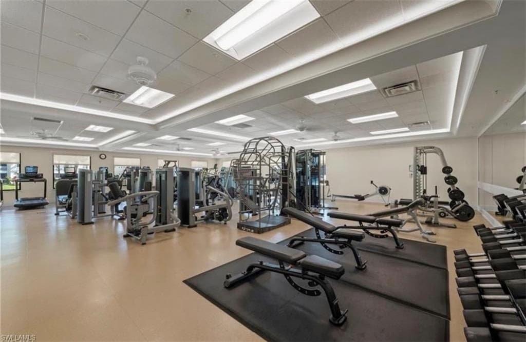 Exercise room with a paneled ceiling
