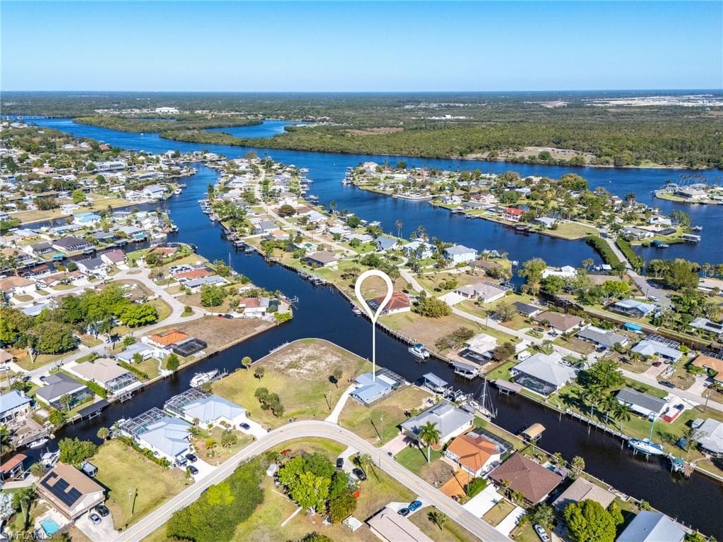 Aerial view of residential area with a large body of water