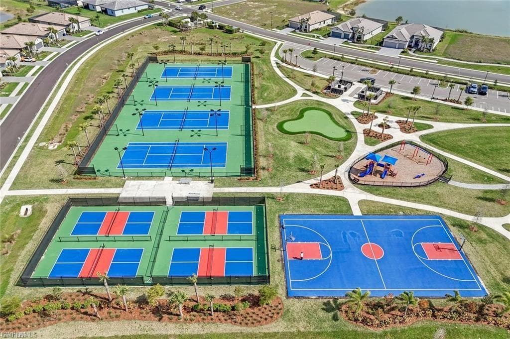 Aerial view of pickle ball, basketball, putting green, play structure