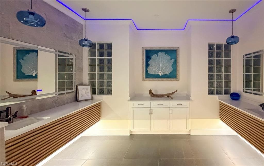 Full bathroom with two vanities