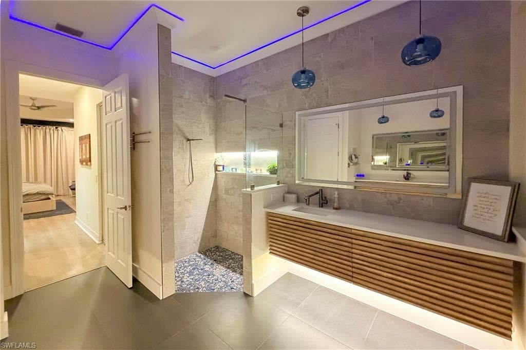 Ensuite bathroom with vanity and a walk in shower