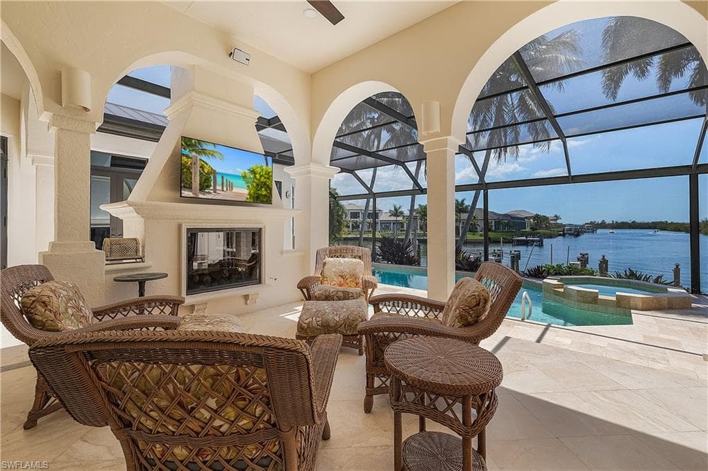 Spacious patio with TV and double side fireplace