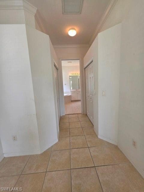 Primary bedroom has 2 walk in closets before entering bathroom