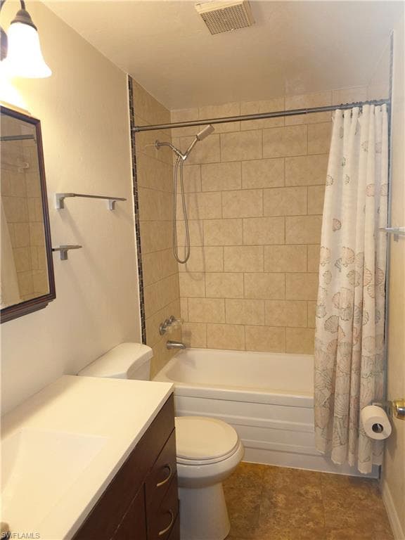 Full bathroom with vanity and shower / bathtub combination with curtain