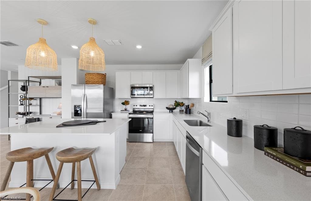 Photos are from a furnished model. Options for this home may vary.