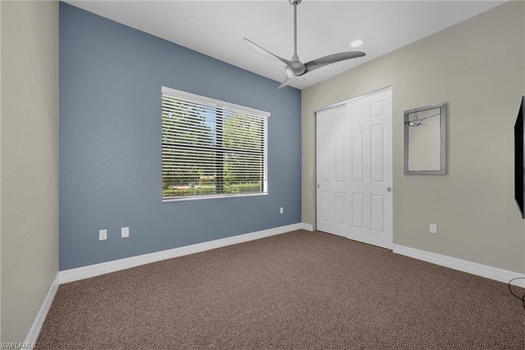Versatile room ideal as a third bedroom, den, or home office with natural light.