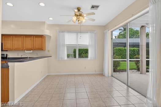 Eat in kitchen with sliders to lanai