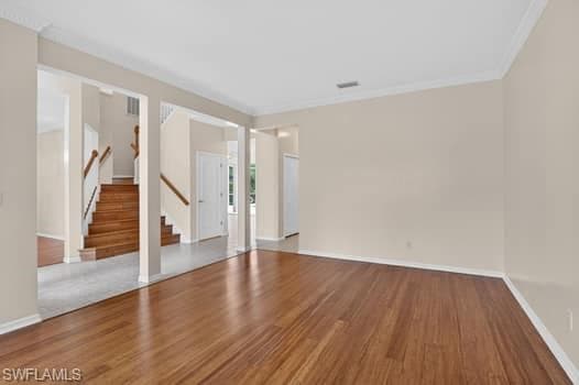 Formal living area with view of staircase
