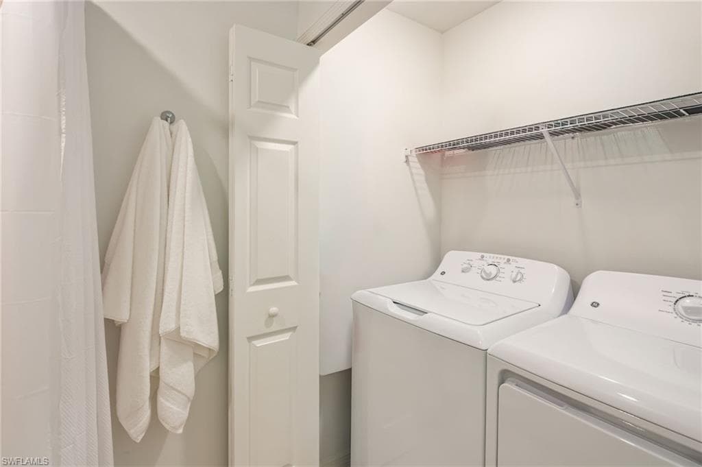 Laundry located inside the guest bath.