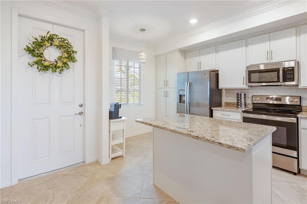 Granite counters, lots of cabinetry and a plenty of counter space.