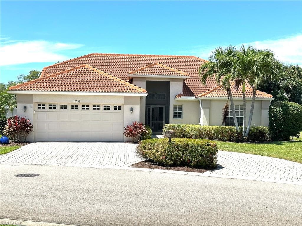 This house is designed for outdoor living with a pool and patio area that extends the full length of the house.
