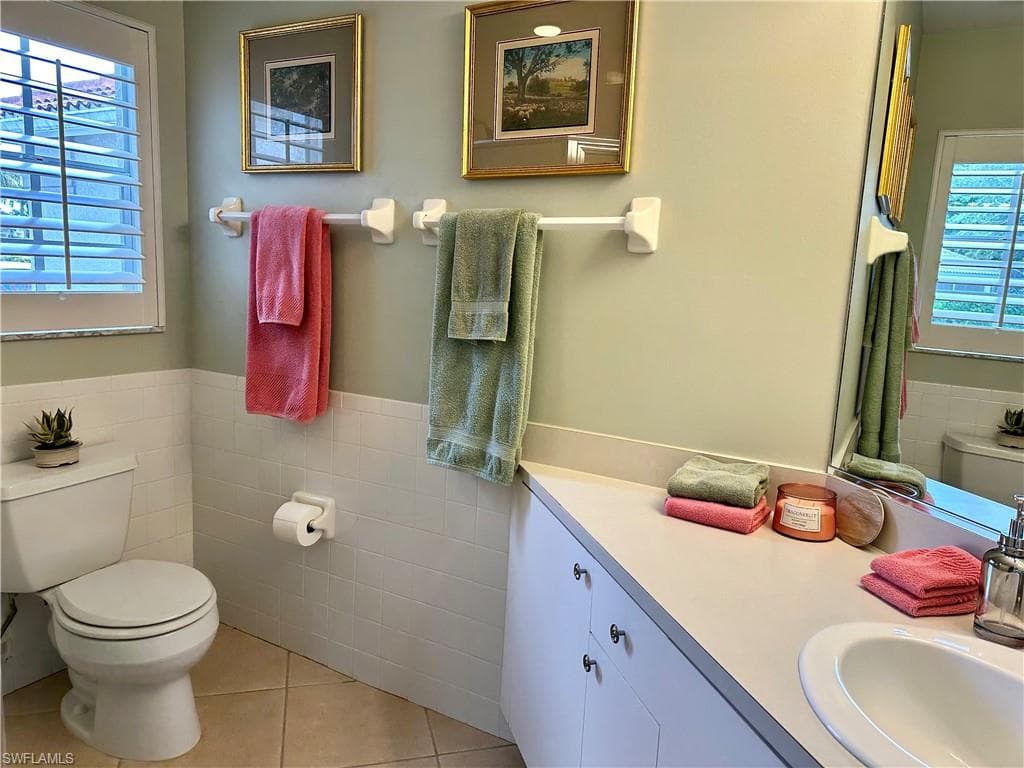 The 2nd bathroom is adjacent to bedroom 2 and 3. It has a shower and a single sink.
