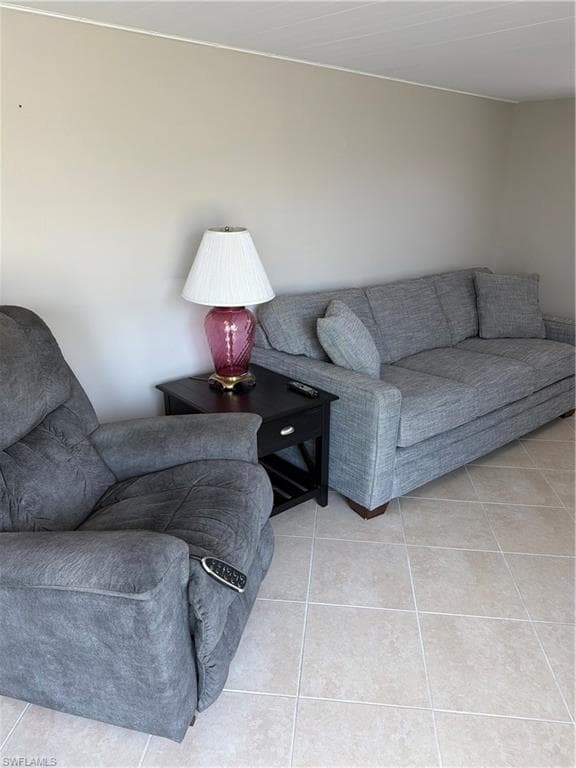 Neutral wall color and light-toned square tile flooring define this interior space