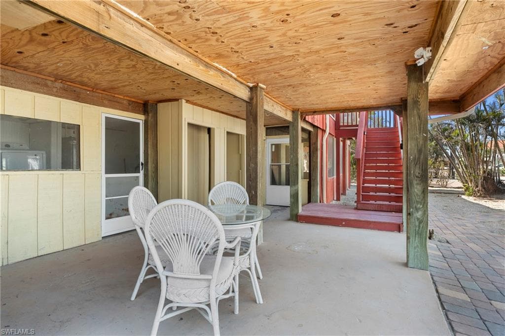 Patio with stairs and outdoor space - Virtually Edited Exterior Image
