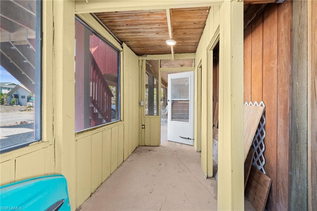 Screened-in storage or utility area - Virtually Edited Image