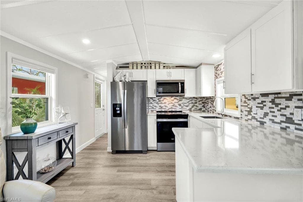 View of kitchen from living area.