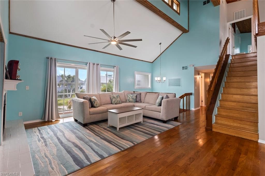 Main living area with soaring ceilings.