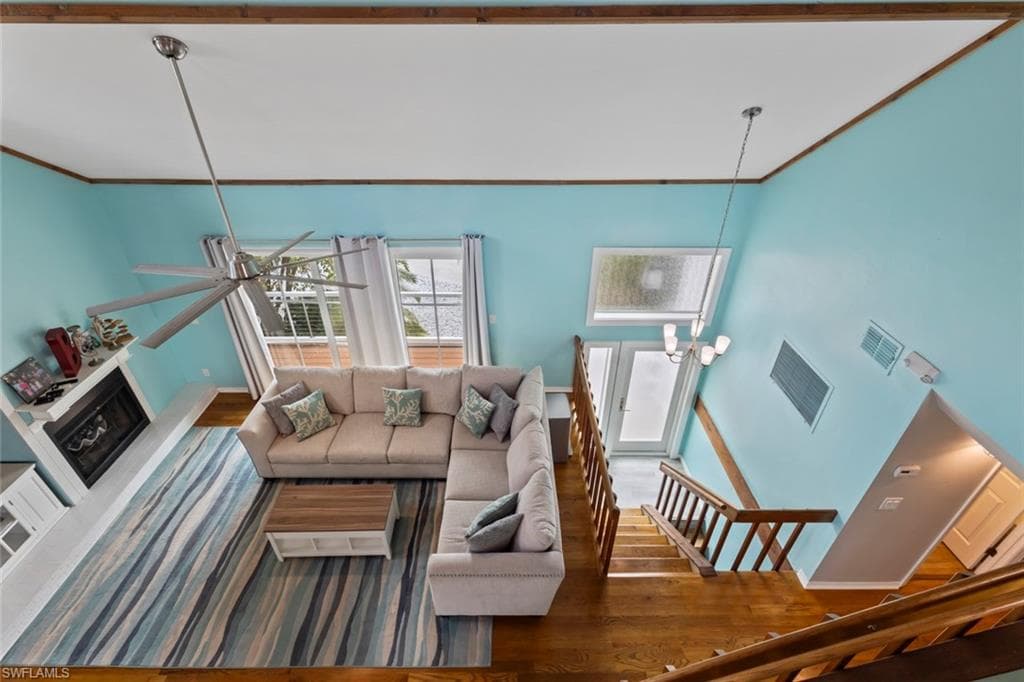 Main living area with soaring ceilings.