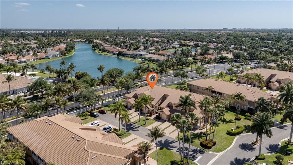 Aerial overview showcasing a prominent residential community with extensive landscaping