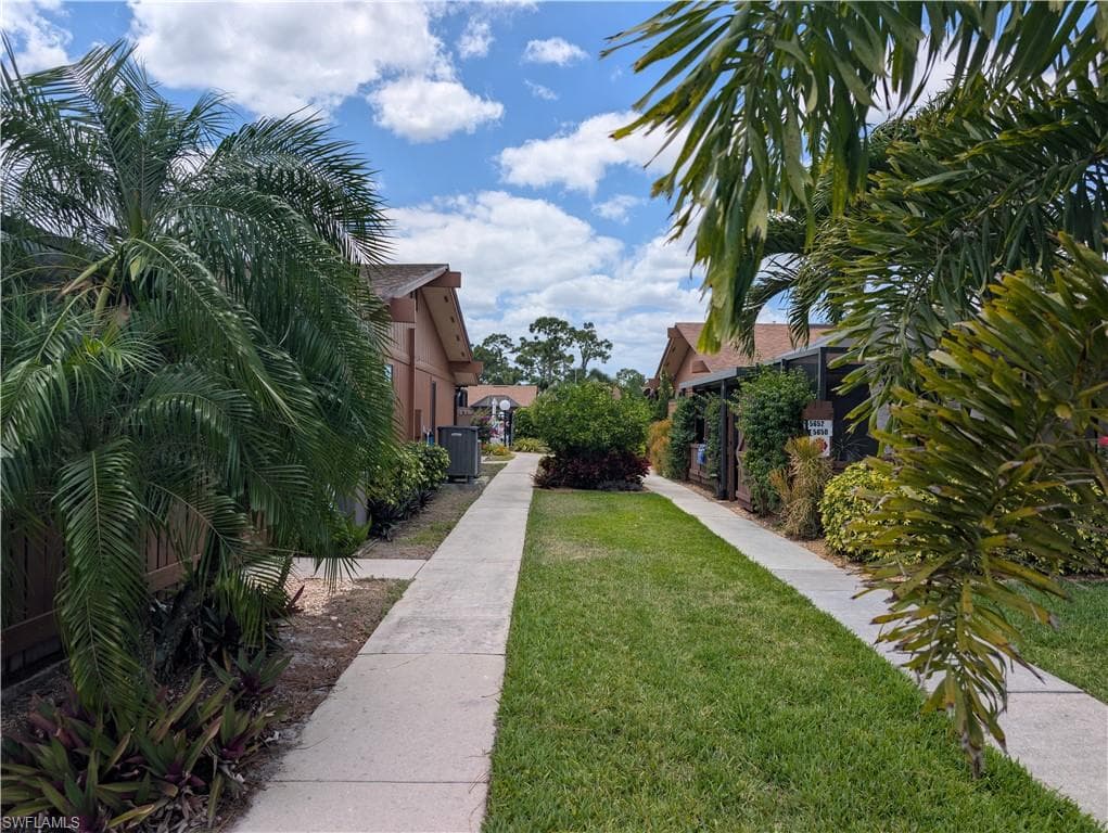 Walkway from parking to unit and pool.