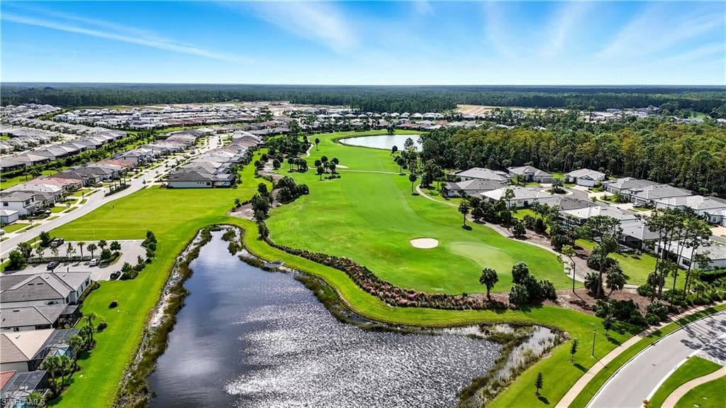 Expansive golf course community featuring multiple water features and mature landscaping